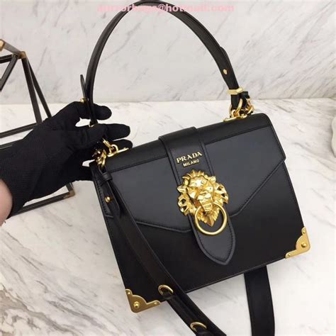 prada lion head bag fake|prada leather bag.